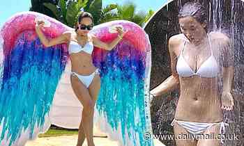 Myleene Klass recreates THAT famous I'm A Celebrity moment as she models white bikini