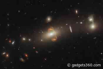 Hubble Telescope Captures Spectacular Mirror Image of Galaxy Created by Gravitational Lensing