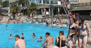 Gezellig druk in openluchtzwembad op warmste dag van het jaar - Het Laatste Nieuws