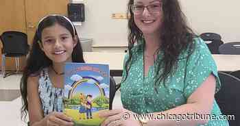 Aurora program helps girl publish book to let kids 'know it's OK to be different' - Chicago Tribune
