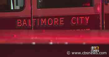 Firefighters Battle Two-Alarm Fire Amid Thunderstorm In Baltimore's Riverside Neighborhood - CBS News