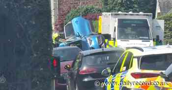 Police shut down Ayr street after car flips onto its side - Daily Record