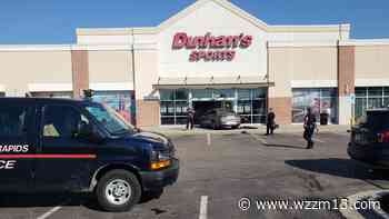 Suspects at large after crashing stolen vehicle into Dunham's Sports - WZZM13.com