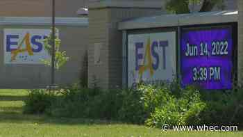 Police arrest man accused of bringing gun to large fight outside East High School