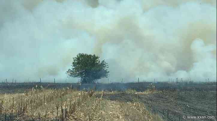 Large brush fire near Pflugerville contained, 16 others across Texas out of control