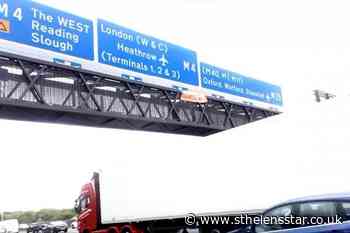 Five arrested as demonstrators climb motorway signs in climate protest - St Helens Star