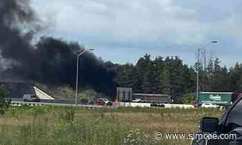 Transport truck fire snarls traffic heading south on Hwy. 400 in Barrie - simcoe.com