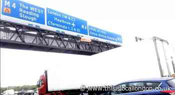M25: Five arrested as demonstrators climb motorway signs