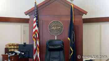 Woman charged with hate crime for crumpling pro police sign told to write 'acceptable' apology - KSL.com