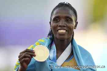 Steeplechaser Jeruto plunges into water after gold at worlds - Dawson Creek Mirror