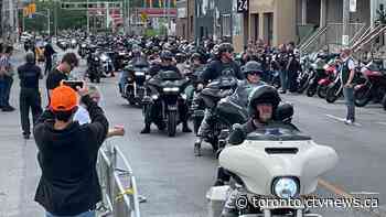 Large 'unsanctioned' Hells Angels procession arrives in Toronto to heavy police presence