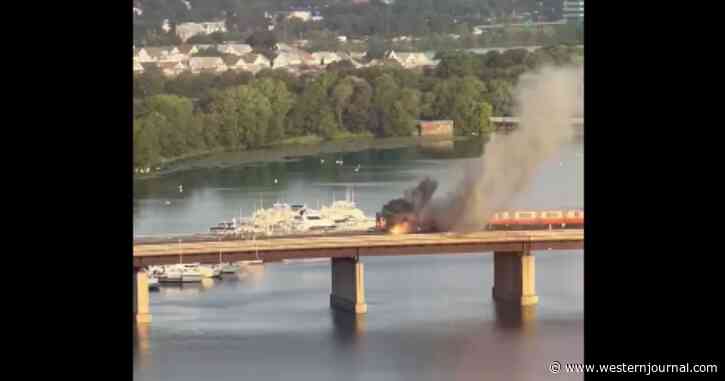 Watch Moment Panicking Commuters Flee as Train Bursts Into Flames, Riders Escape Through Windows, One Ends Up in River