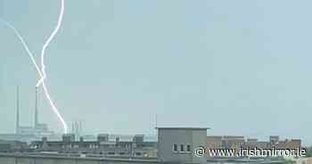 Phenomenal video shows lightning strike Dublin’s Poolbeg Towers amid thunderstorm ‘as loud as bombs’ - Irish Mirror
