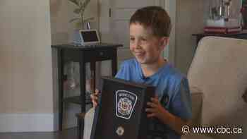 'Hero' boy recognized for saving family in Moncton house fire - CBC.ca