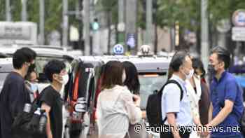 Japan's daily coronavirus cases surpass 200,000 for 1st time - Kyodo News Plus