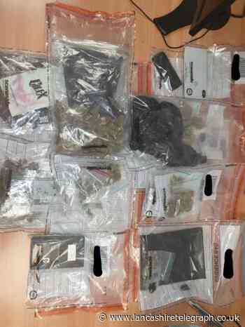 Blackburn: Two arrested as drugs and cash found