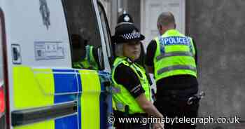 Armed police at Grimsby street after man enters house 'armed with weapon' - Grimsby Live