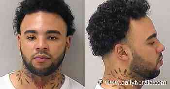 Man gets 12-year sentence for robbing Aurora store - Daily Herald