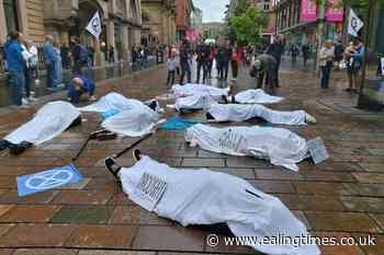 Climate activists stage 'die-in' protest in Glasgow following record temperatures - Ealing Times