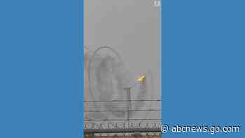 WATCH:  Wind turbine set ablaze from reported lightning strike