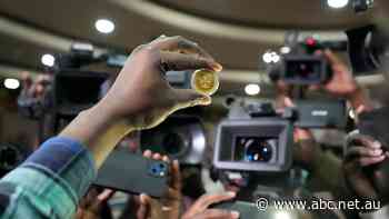 Zimbabwe debuts gold coins as legal tender to curb inflation