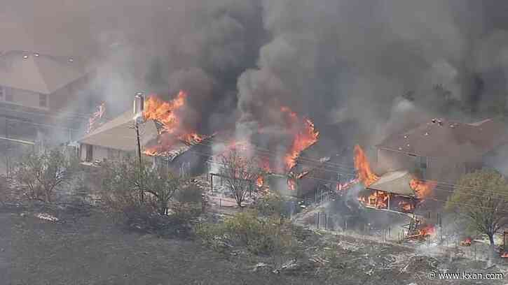 Grass fire in Dallas suburb spreads to homes, 9 destroyed
