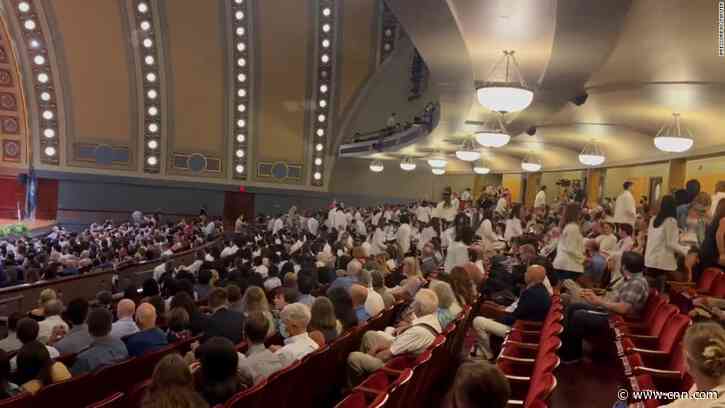 Michigan medical students walk out of induction ceremony to protest keynote speaker with anti-abortion views - CNN