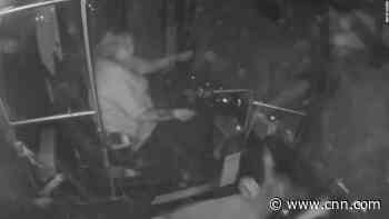 Watch bus driver's reaction as deer crashes through the front window