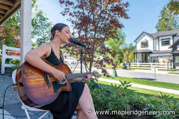 PHOTOS: Ribbon spliced on new master-plan community - Maple Ridge News