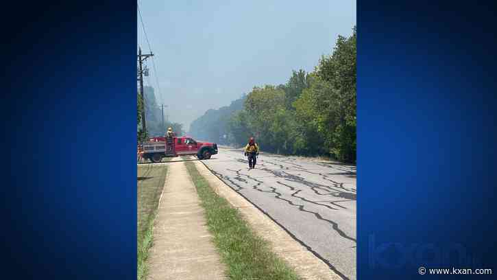 Crews fight grass fire near Buda neighborhood