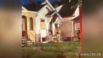 Early morning fire in Regina sends 2 to hospital