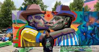 ‘Chanate’ lleva mural del beso entre aficionados del Tigres y Monterrey a Dinamarca - El Financiero