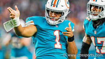 LOOK: Tua Tagovailoa throws 65-yard bomb to Tyreek Hill at Dolphins training camp, sends crowd into a frenzy