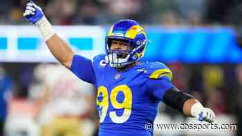 Aaron Donald says he'll remain with Rams and continue playing football as long as Sean McVay remains