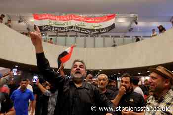 Iraqi protesters camp out in parliament for second day - St Helens Star