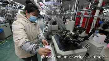 Covid-Ausbrüche: Erholung in Chinas Industrie verlangsamt