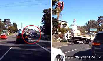 Dash cam footage captures moment truck is ripped apart in crash - Daily Mail