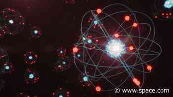 Where do electrons get energy to spin around an atom's nucleus?