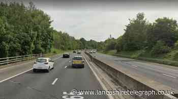 M65 closed after man being chased by police smashed into crash barrier and fled scene