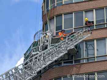 Two window washers rescued from tenth floor after losing power