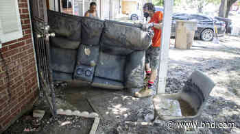 Volunteers help cleanup flooded East St. Louis, IL homes - Belleville News-Democrat