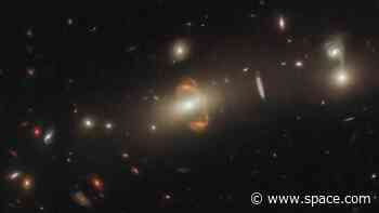 Hubble Space Telescope captures trippy 'mirror image' view of distant galaxy