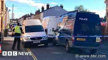 Murder charge after man found dead at house in Gloucester - BBC
