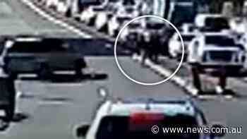 Horror as toddler caught in peak hour traffic - news.com.au