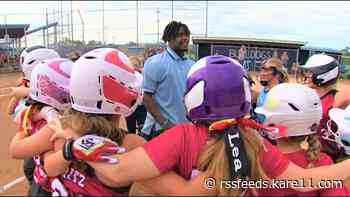 Cheerleading, backflipping umpire is the talk of Minnesota youth softball