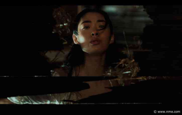 Watch Rina Sawayama break free from 19th century time loop in ‘Hold The Girl’ video