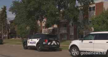 Woman charged with manslaughter after man found dead in Edmonton stairwell - Global News