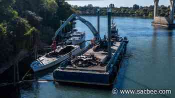 Burned-out boat pulled from Sacramento River. What about the other 50 in the Delta? - Sacramento Bee