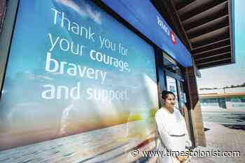 Saanich bank reopens after shootout that wounded six officers, killed two gunmen - Times Colonist