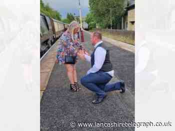 Loving couple get engaged on the East Lancashire Railway